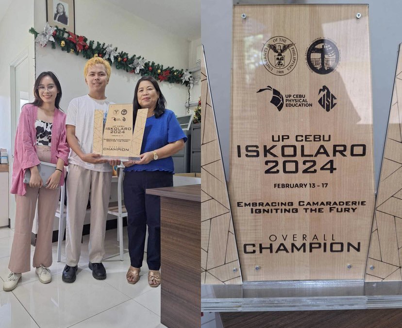 Sciences Federation officers hands Dean Ereno the overall champion Iskolaro 2024 trophy